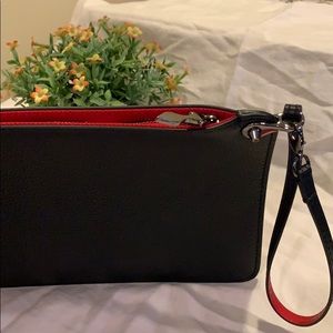 Christian Louboutin wristlet 🌹